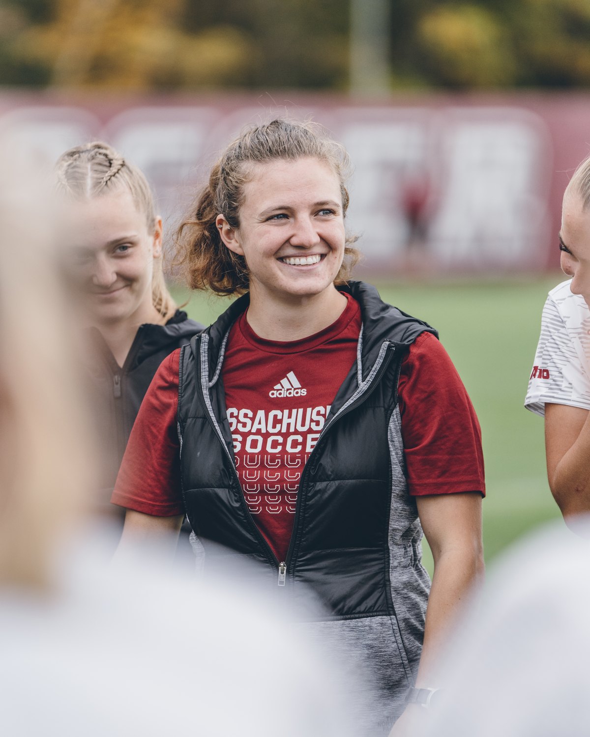 Julia Villani with her team on the field